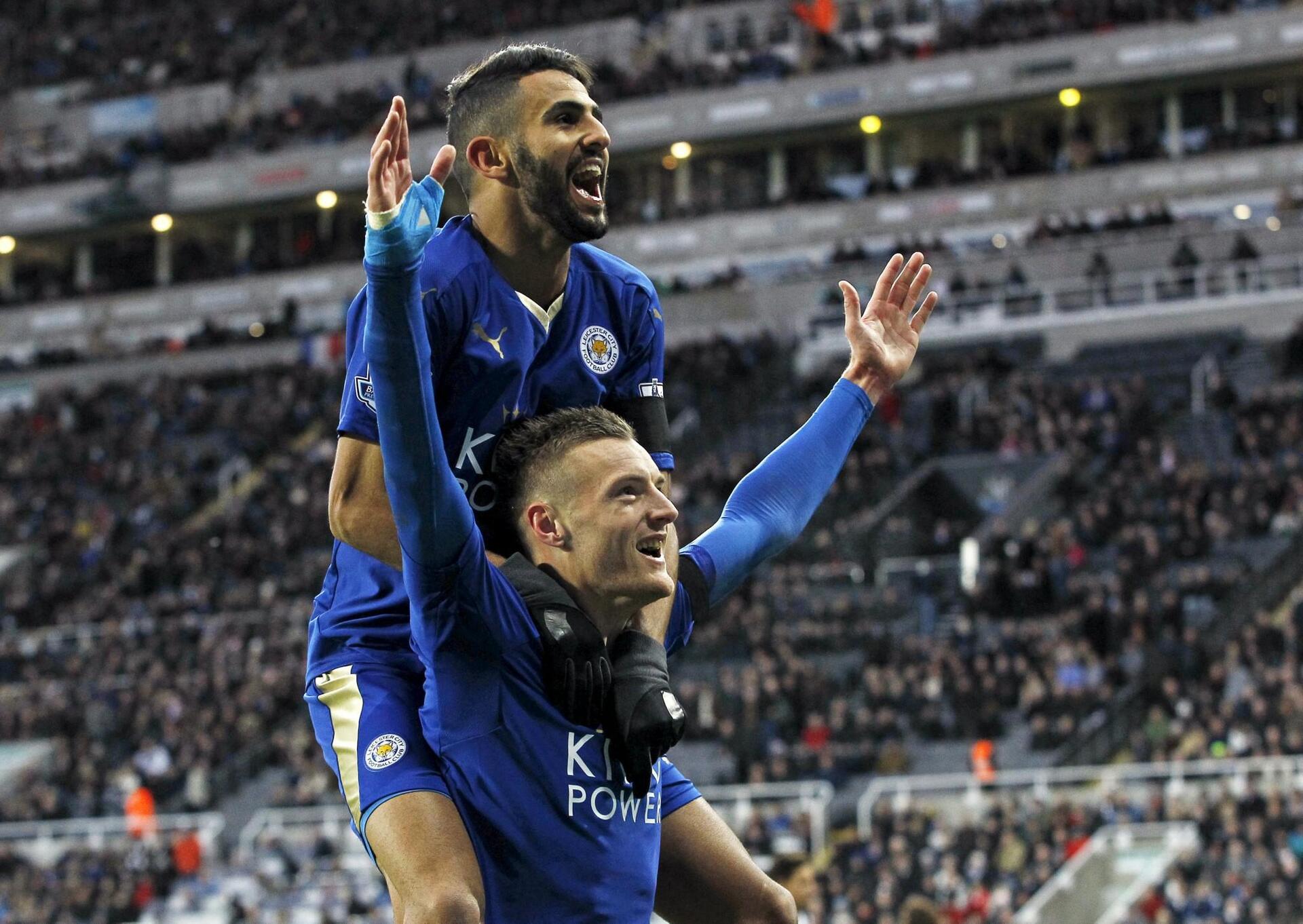 File photograph of Vardy celebrating with Mahrez after scoring the first goal for Leicester City during their English Premier League soccer match against Newcastle United