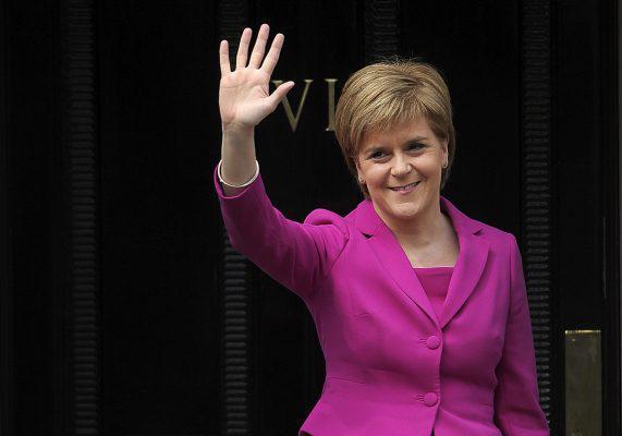 Scotland's First Minister and SNP leader Nicola Sturgeon waves to the media in Edinburgh, Scotland, on May 6, 2016. Scottish nationalists won a third term in power but lost their outright majority Friday in one of a series of local and regional elections seen as a key test for Labour leader Jeremy Corbyn. / AFP / Andy Buchanan (Photo credit should read ANDY BUCHANAN/AFP/Getty Images)