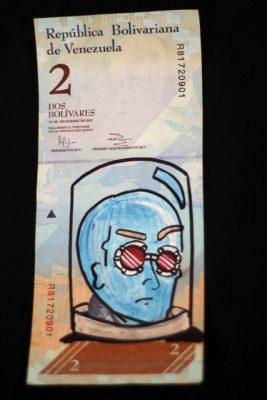 A two-bolivar Venezuelan bill with a drawing by artist Jose Leon is seen at his workshop in Maracaibo, Venezuela June 16, 2016. REUTERS/Stringer. EDITORIAL USE ONLY. NO RESALES. NO ARCHIVE.