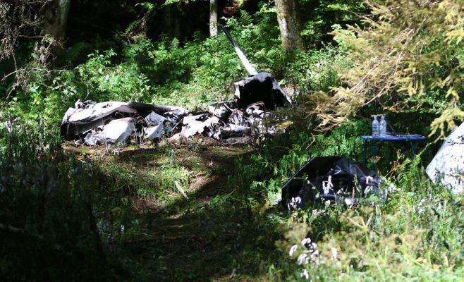 epa05425068 Debris of a burned Piper PA-32 which crashed in a wood at Predmeja village near Ajdovscina, some 50 kilometers west of Ljubljana, Slovenia, 14 July 2016. According to reports, all four people aboard the plane were killed in the crash. Among the victims was Unister founder Thomas Wagner, the company confirmed media reports. EPA/SASA DESPOT
