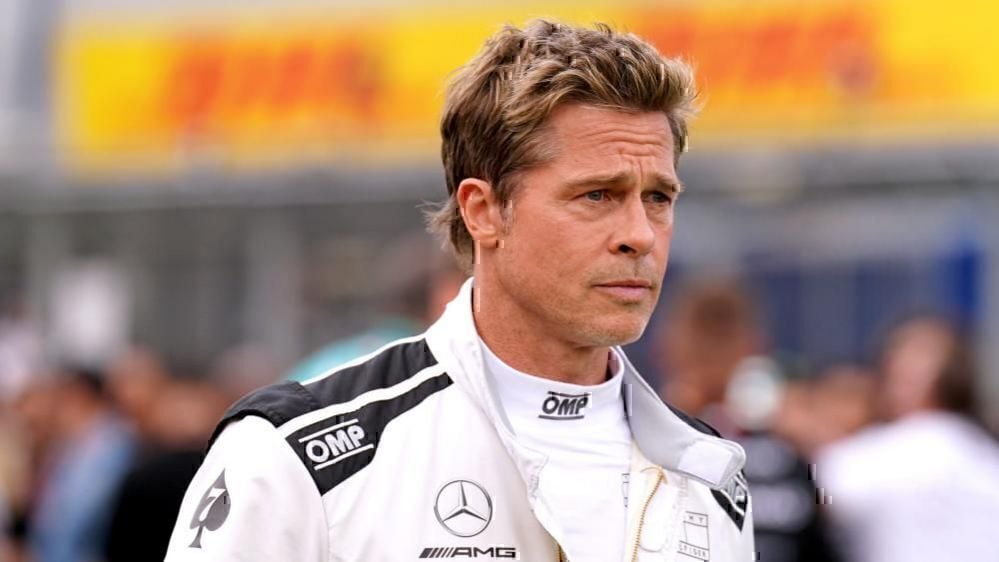 Brad Pitt in pilot’s uniform at the British Grand Prix
 – 2024-07-09 19:08:35